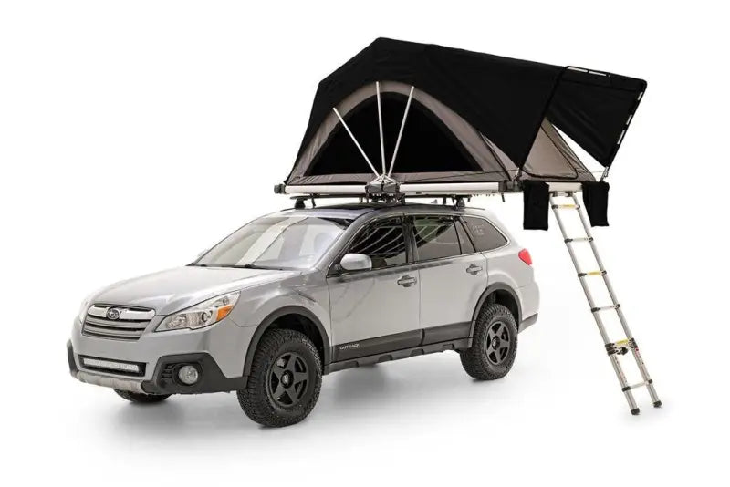 Silver car with rooftop tent and ladder from Freespirit High Country Series 55