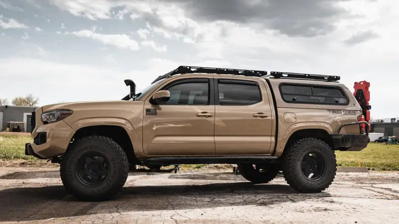 Lifted 2019 Toyota Tacoma 4x4 with Sherpa Equip Crow’s Nest truck topper rack