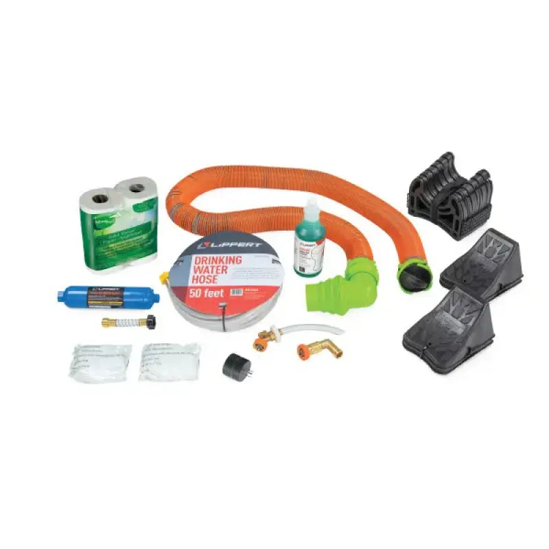 Lippert RV Starter Kit - Standard accessories, including drinking water hose, toilet paper, chocks, and cleaner for an essential RV setup.