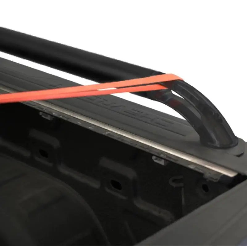 Putco Black Nylon Boss Locker side rails with truck bed rack and orange strap