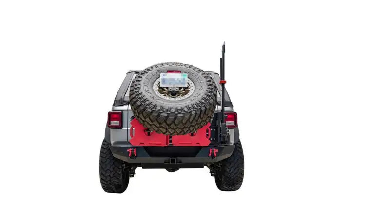 Rear view of a modified Jeep Wrangler JL Gen 3 with tire carrier for off-road adventures