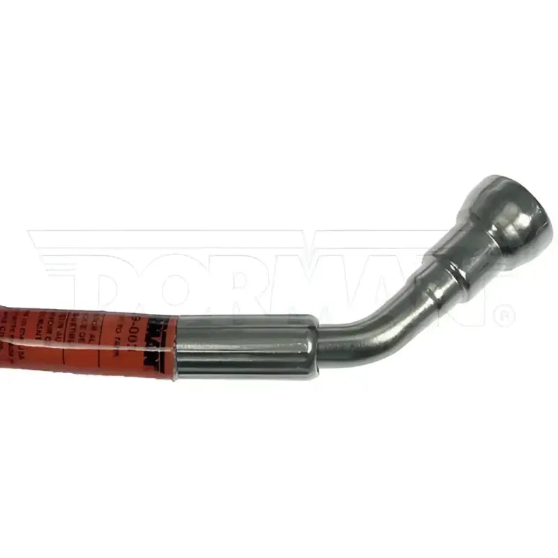 Bent metal tube with orange label on Dorman Braided Fuel Line for easy fuel line replacement
