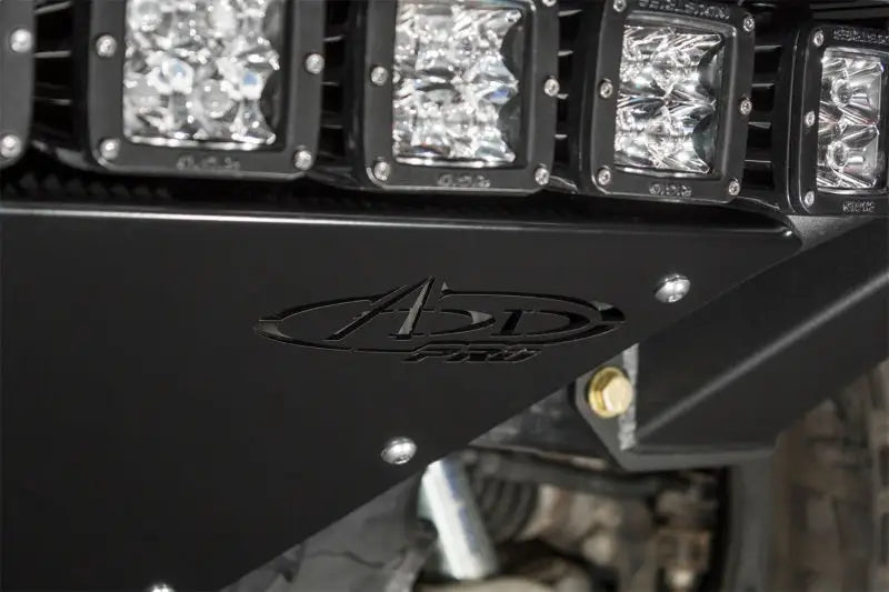Black metal Addictive Desert Designs ADD PRO Front Bumper with lights for Ford F-150 Raptor