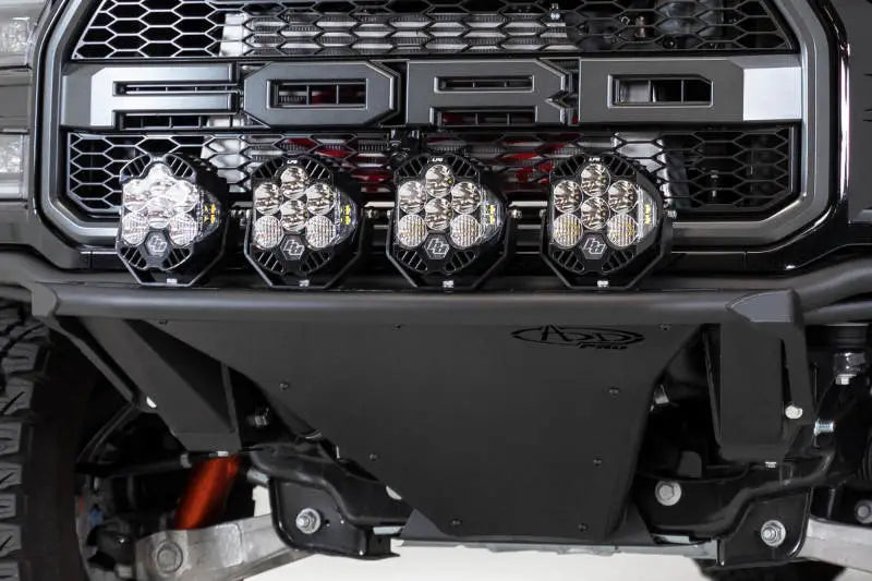 Ford Raptor with addictive desert designs light hoop and aftermarket bumper in black