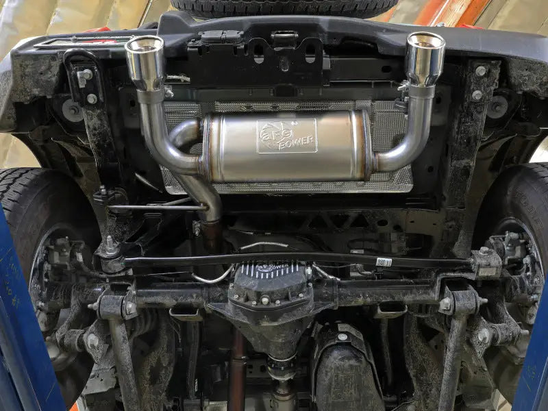 Shiny metal exhaust system on aFe Vulcan 3in Ford Bronco with carbon tips
