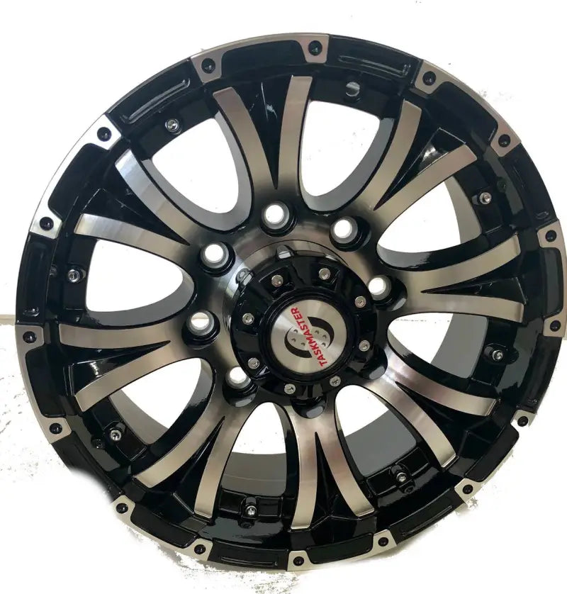 Black and silver AX02660865BMFL Taskmaster wheel on aluminum rim for AX02660865BMFL