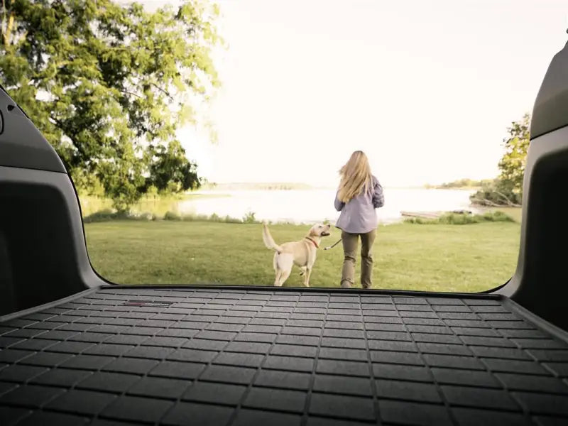 Black rubberized cargo area liner with raised edges, non-skid TPE material