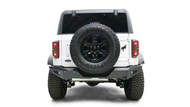 Rear view of a white 2021-2022 Ford vehicle with a mounted spare tire, featuring the sturdy FB21-Y5252-1 Fab Fours rear bumper for enhanced protection and style.