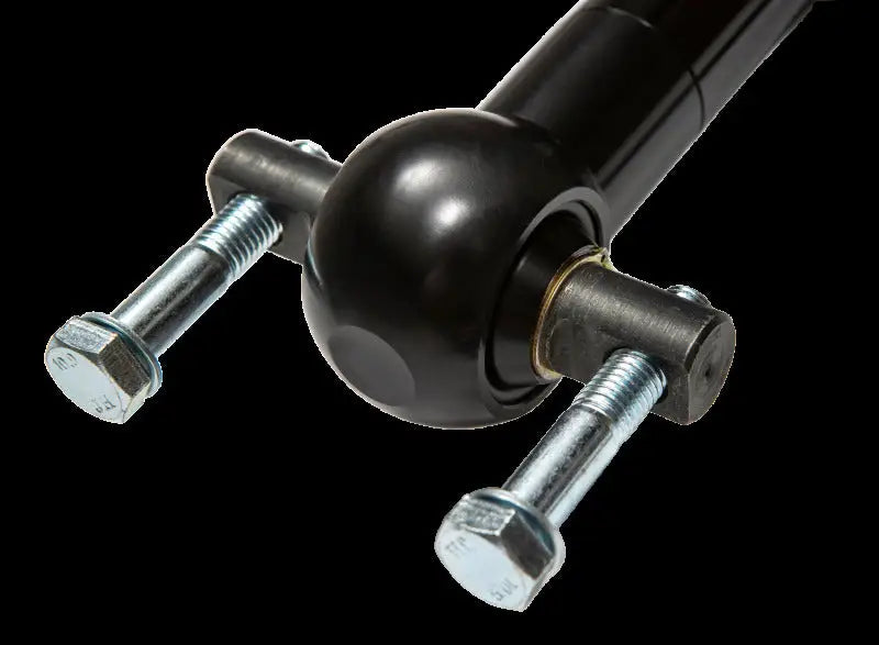 Fox 21+ Ford Bronco 2.5 Performance Series Front Coil-Over Reservoir Shock w/ UCA - Adjustable, close-up view of mounting bolts and shock absorber.