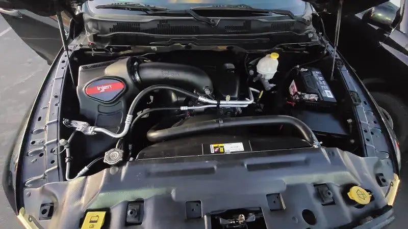 Dodge Ram engine compartment with Injen cold air intake for easy installation