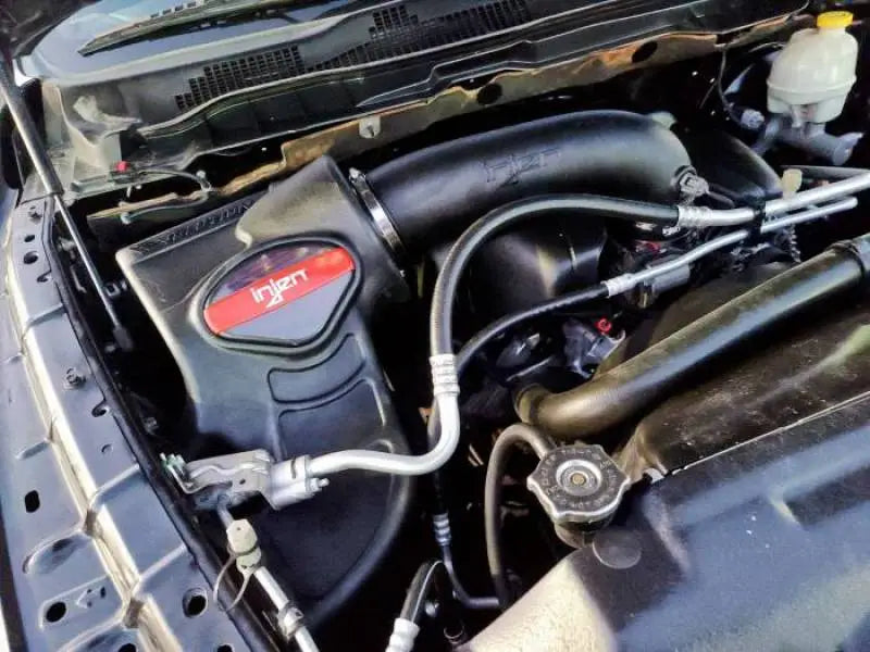 Black engine air intake system on Dodge Ram for easy installation and cold air intake boost