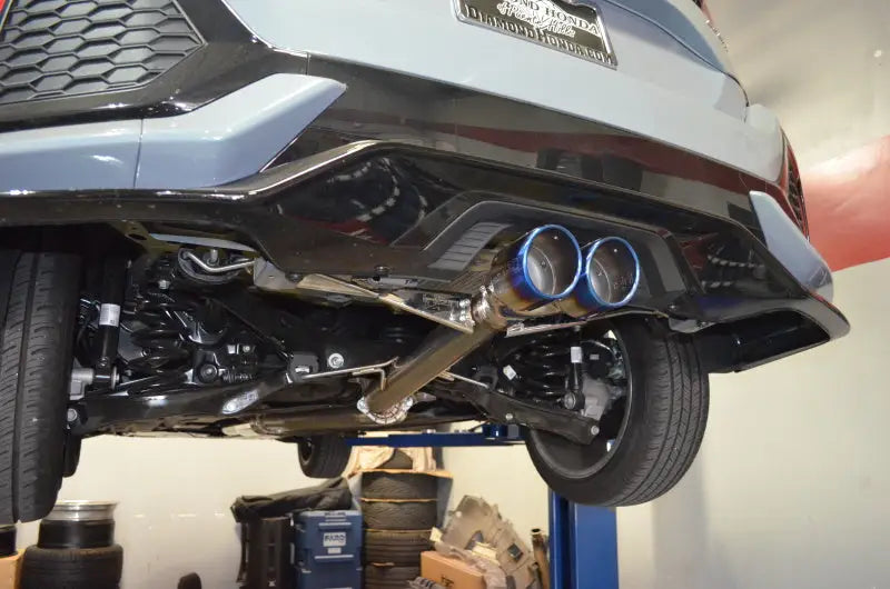 Honda Civic hatchback exhaust system with blue titanium tips for sporty look