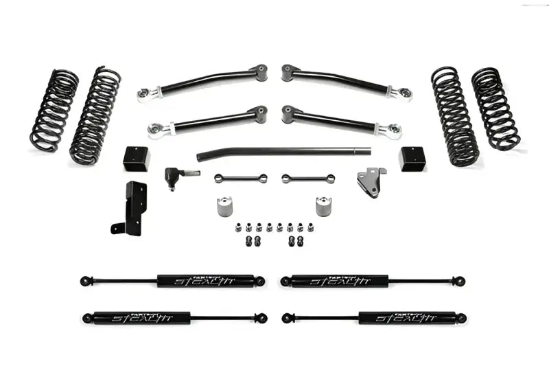 K4117M Fabtech 3' Trail with Stealth Shocks for 2018 Jeep Wrangler JL 4WD 4-door, enhancing ground clearance, durability, and performance.