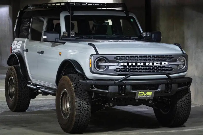 License Plate Relocation Kit Relocates Below The Center At An Angle On Front Bumper; Powder Coated; Black; Steel