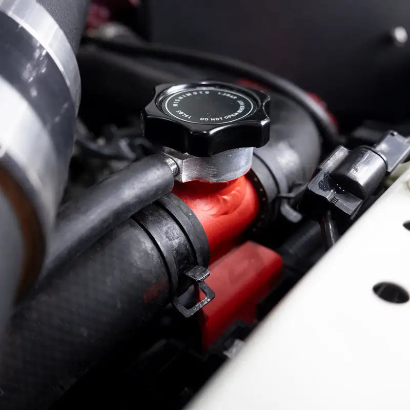 Mishimoto 08-15 Mitsubishi Lancer Evo X Coolant Fill Inlet - Black - Mishimoto
