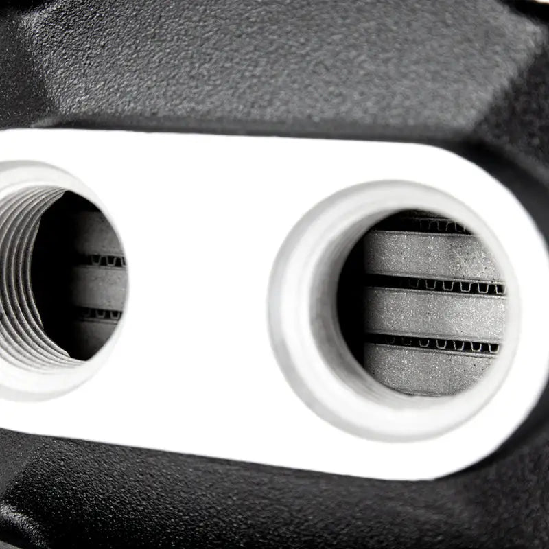 Metal heat exchanger ports on Mishimoto Universal Air-To-Water Intercooler for high performance