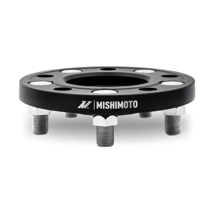 Black mishimoto wheel spacers with studs for 5x120 wheels, boosting your mishimoto wheel setup