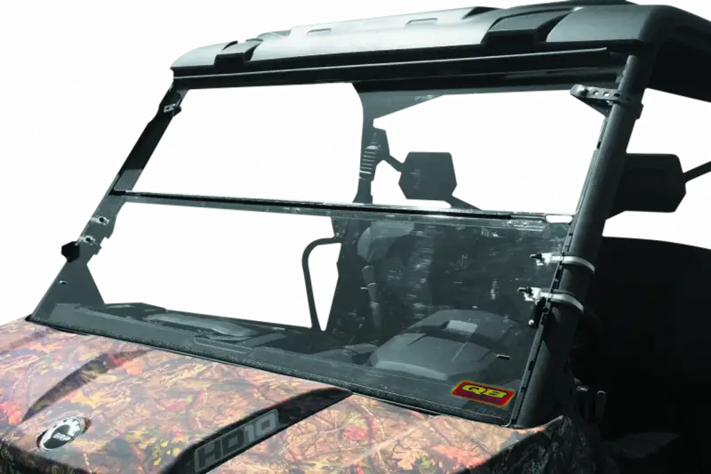 Camouflage utility vehicle with windshield showing Can-Am Defender HD10 windbreak folding windshield