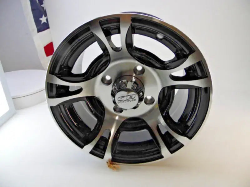 Black and silver aluminum wheel for QuadBoss QB Oil Seal Set and oil seal replacement