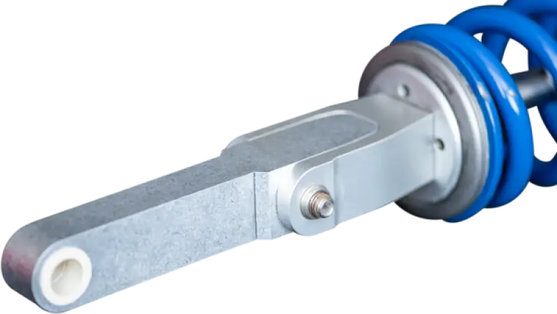 Blue coiled spring and silver shock absorber from Rale Industries Yam Fit Kit
