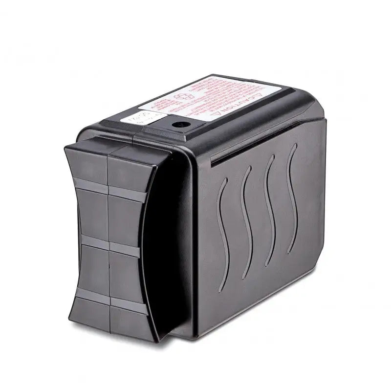 Black plastic humidifier filter housing.