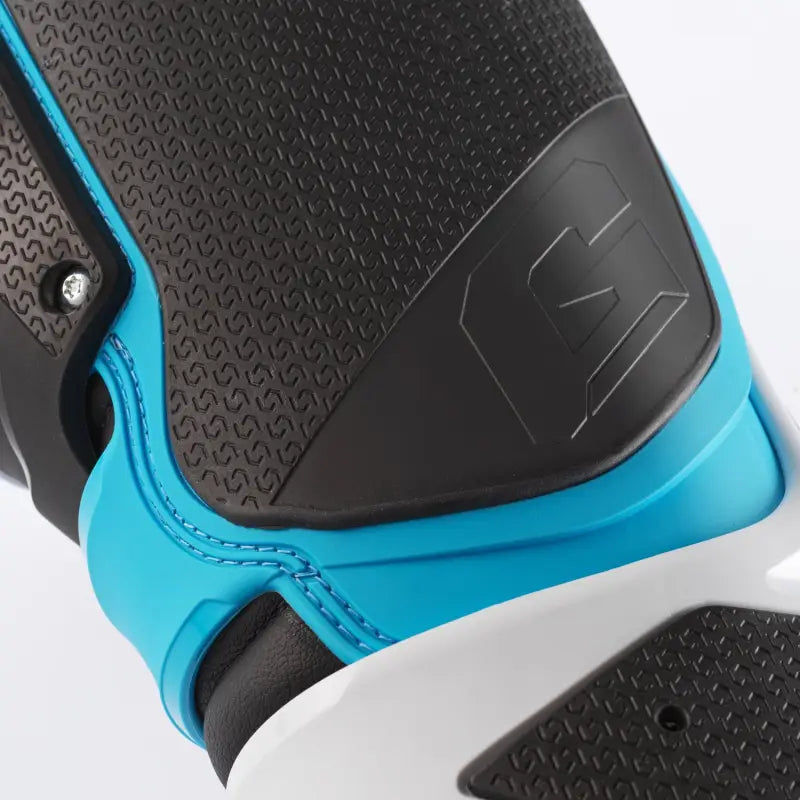Close-up of Sg 22 Boots Le White/Black/Light Blue athletic shoe with textured details for guard dual and rv parts & accessories