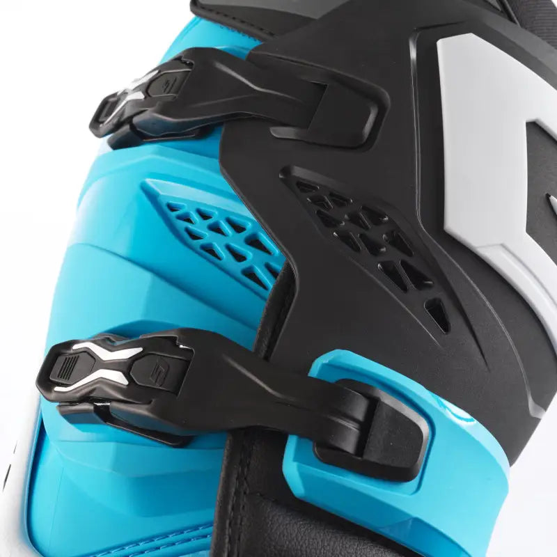Blue and black motocross boot with adjustable buckles, ventilation, guard dual style