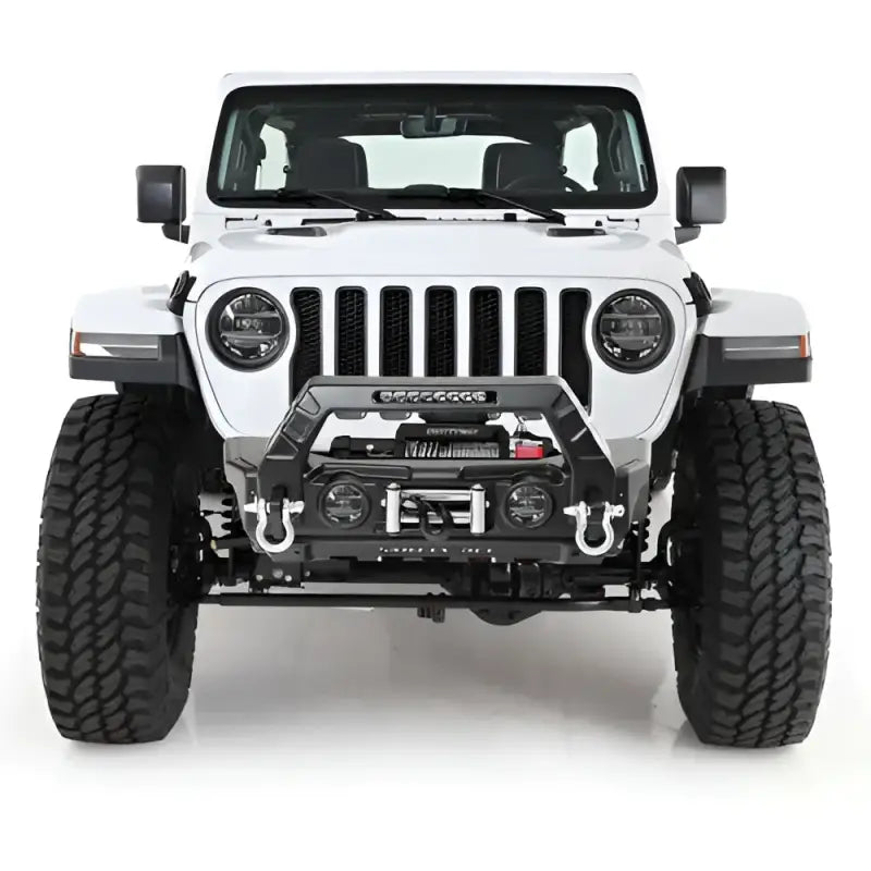 Front view of a rugged white off-road vehicle featuring the Smittybilt Gear Tail Gate Cover in black, enhancing protection and style.