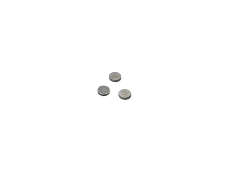 Three silver button batteries for Nissan RB26 factory shim replacement in the product