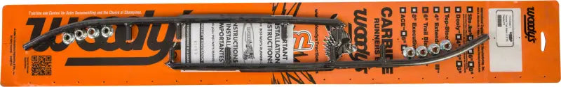 Black metal snowmobile carbide runners with mounting hardware on orange packaging for trail blazer round use