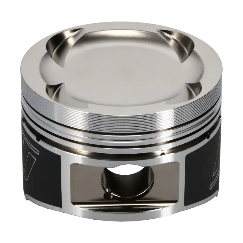 Shiny metal Wiseco Toyota Turbo piston from shelf stock kit for turbo engine upgrade