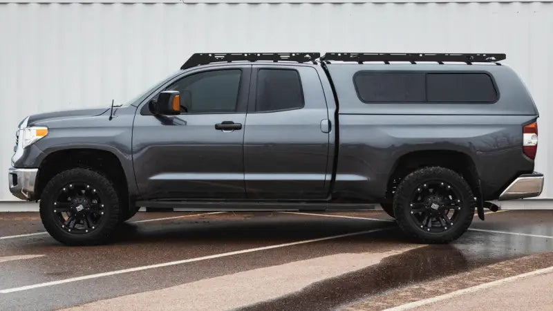 Dark gray Toyota Tundra with Sherpa Equip Little Bear full fairing for outdoor adventures