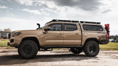 Lifted 2019 Toyota Tacoma 4x4 with Sherpa Equip Crow’s Nest truck topper rack