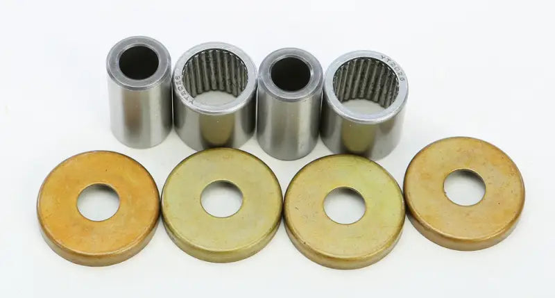 Metal bushings and flat washers from 28-1133 Swingarm Bearing Kit for swingarm bearing repair