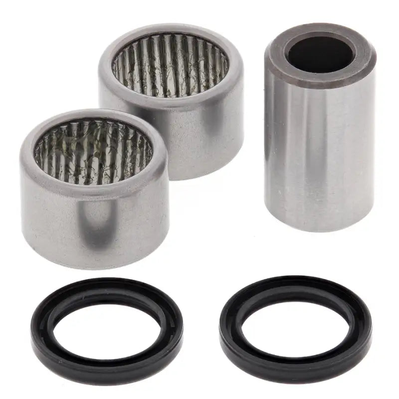 Shock bearing kit with needle roller bearings, steel shaft, and rubber seals