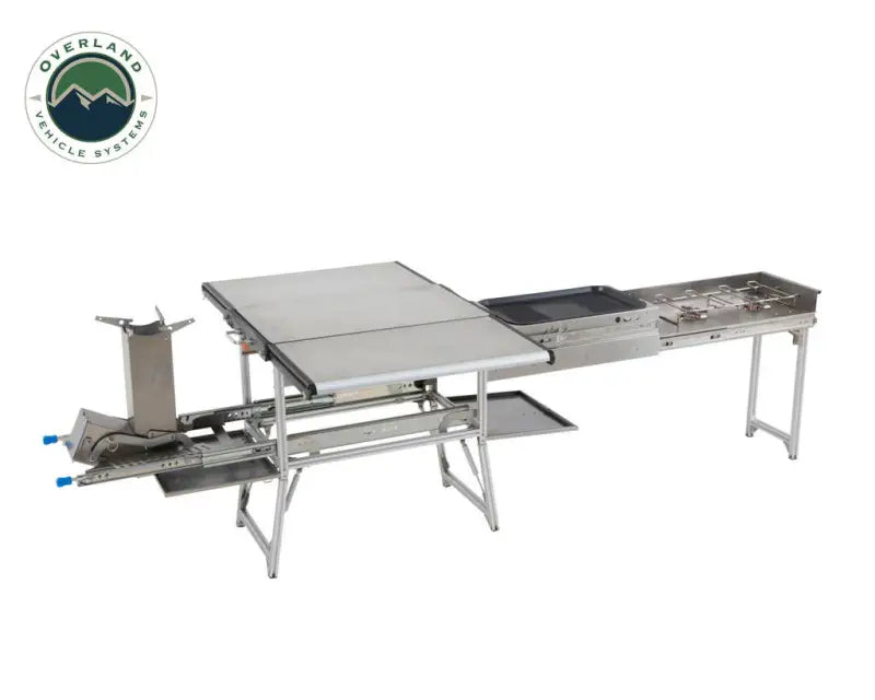 Silver camp kitchen with dual grill and table for Overland VCL Komodo camping trips
