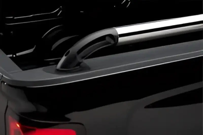 Putco Black Nylon Boss Locker Side Rails with black plastic luggage rack and silver metal bars and hooks