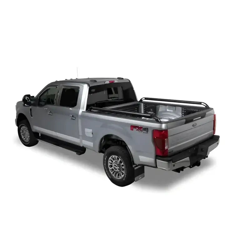 Silver pickup truck with Putco Black Nylon Boss Locker Side Rails for pickup bed security