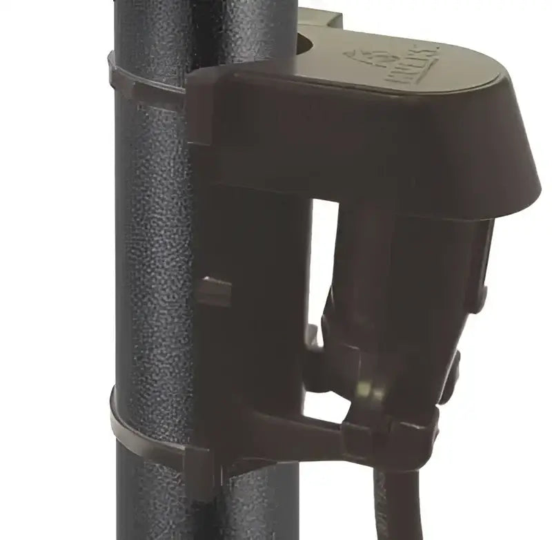 Close-up of a black 5555 NGK Import Plug installed on a vehicle component.