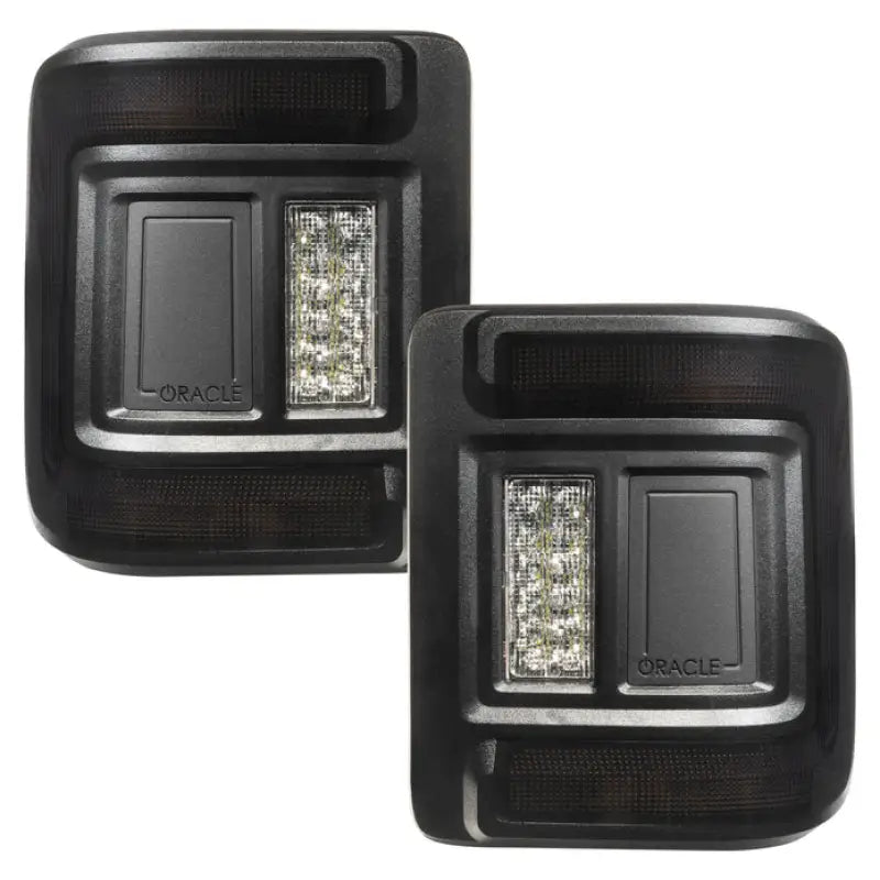 Two black LED tail lights from Oracle Light for Jeep JL model 5884-504-T