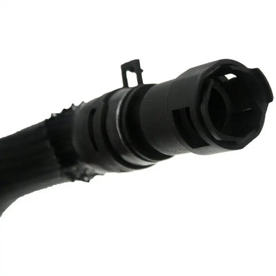 Black plastic hose connector from Dorman engine heater hose assembly for engine heater use