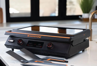 Cook indoors or outdoors with the 8001 Blackstone E-Series 22' Electric Tabletop Griddle's ceramic titanium surface.