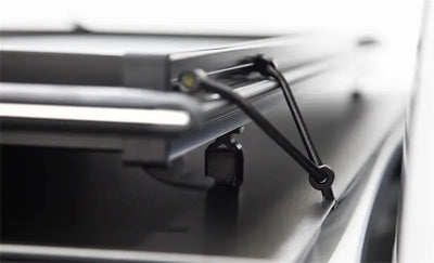 Sturdy black metal folding step stool with rubber feet for LOMAX Tri-Fold Cover