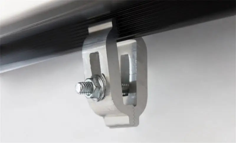 Silver clamp with bolt nut for Lomax tri-fold cover on Ford Super Duty