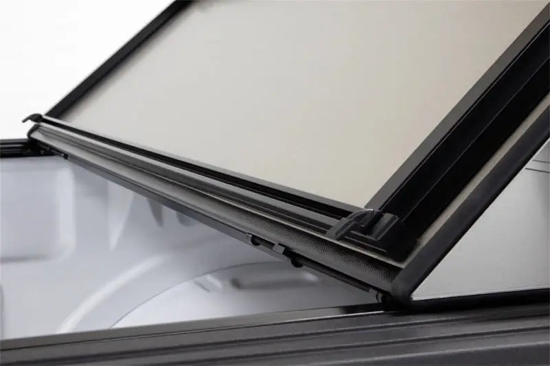 Black and silver sunroof with rubber seal on LOMAX Tri-Fold Cover