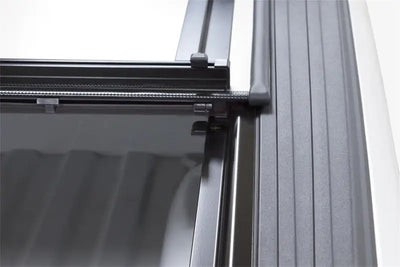 Black zippered mesh screen door on LOMAX Tri-Fold Cover for Ford Super Duty