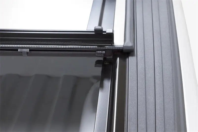Black zippered mesh screen door on LOMAX Tri-Fold Cover for Ford Super Duty