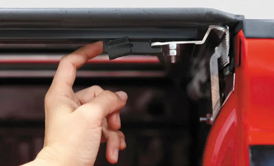 Black plastic Ford Ranger drawer handle with silver accents for Access Tonnosport roll-up cover