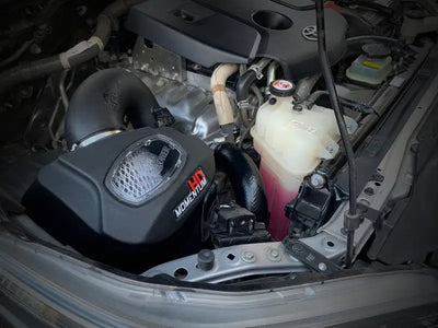 Car engine compartment with aFe 15-20 Toyota Hilux Momentum HD Cold Air Intake System