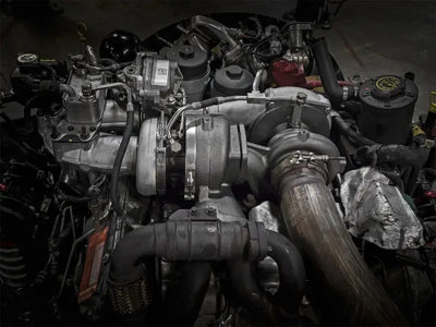 Complex diesel engine assembly for aFe BladeRunner Street Series turbocharger on Ford V8-6.4L trucks